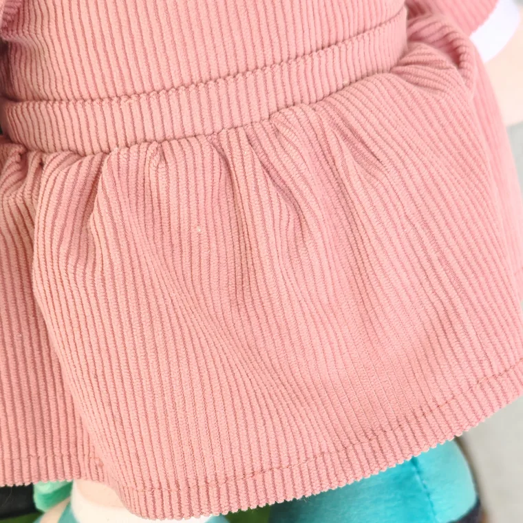 Macro photograph of the corduroy skirt of Lotti's dress