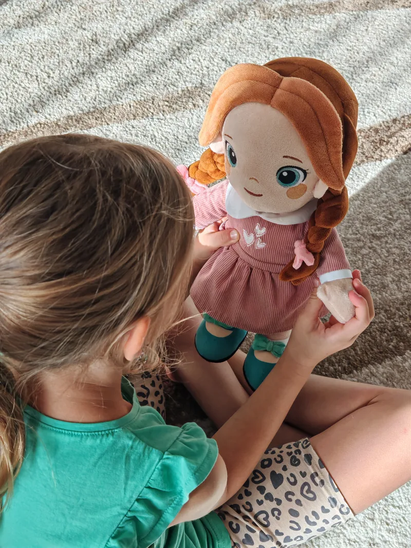 A child talking to the plush